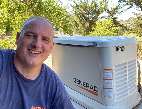 Our expert finishing a clean and safe generator installation services project for a local family.