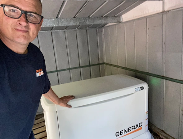 Our expert is finishing a generator installation services project.