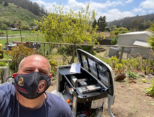 A specialist changing oil and parts as part of our high-quality generator maintenance services in San Carlos.