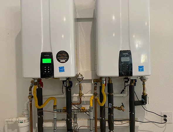 Two white power battery units installed on a wall to provide reliable battery backup services.