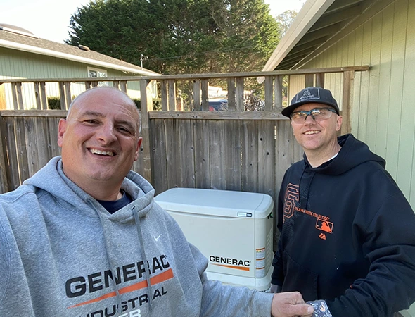 Two of our specialists discussing the best placement for a new generator at a Hillsborough property.