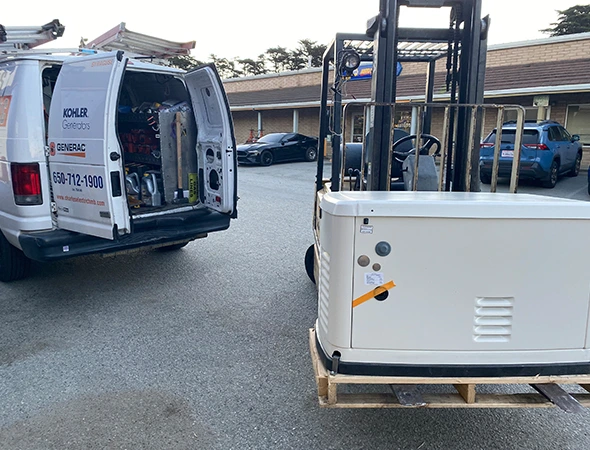 A white service truck loaded with equipment for a professional Kohler generator setup in Hillsborough.