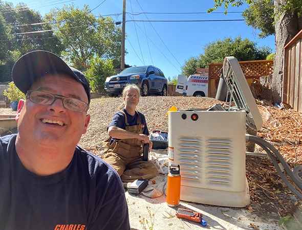 Working on the fuel system of a large backup unit to ensure it's ready for any power outage in Los Altos Hills.