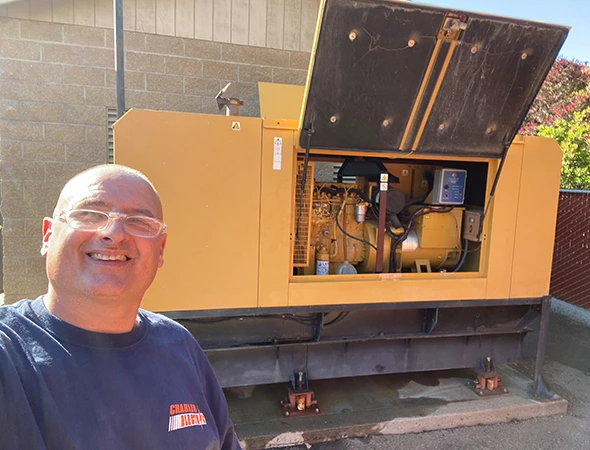 Inspecting the cooling and exhaust components of a high-capacity unit during a Los Altos Hills service visit.