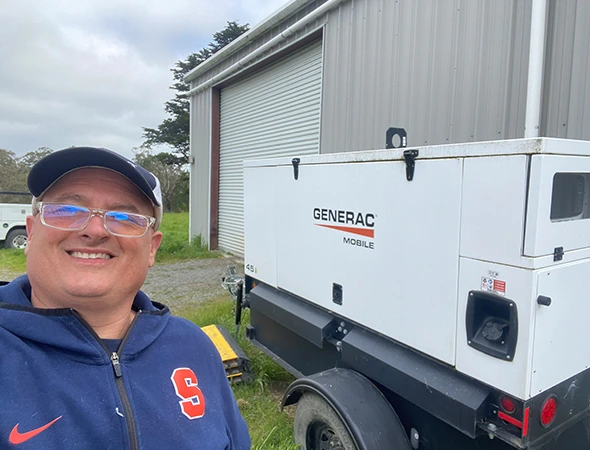 Our technician checking the battery and electrical starting system of a mobile generator in Los Altos Hills.