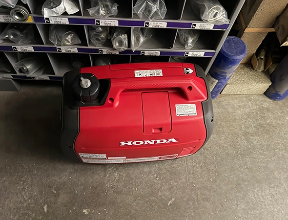 A close-up of a small red portable unit we recently serviced for a client in Portola Valley.